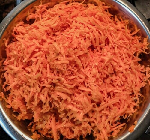 shredded_carrots in a strainer